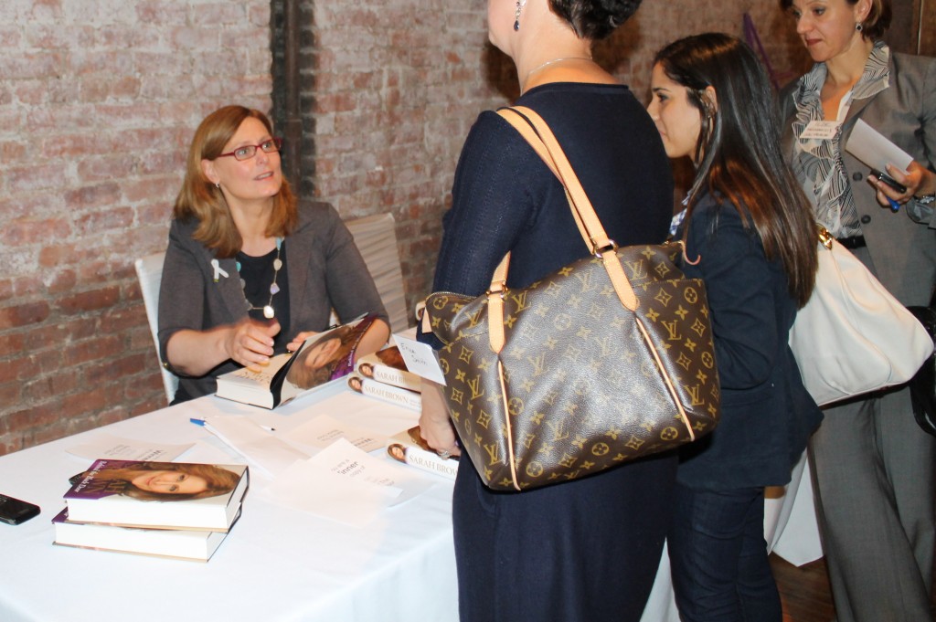 Sarah Brown autographing her book